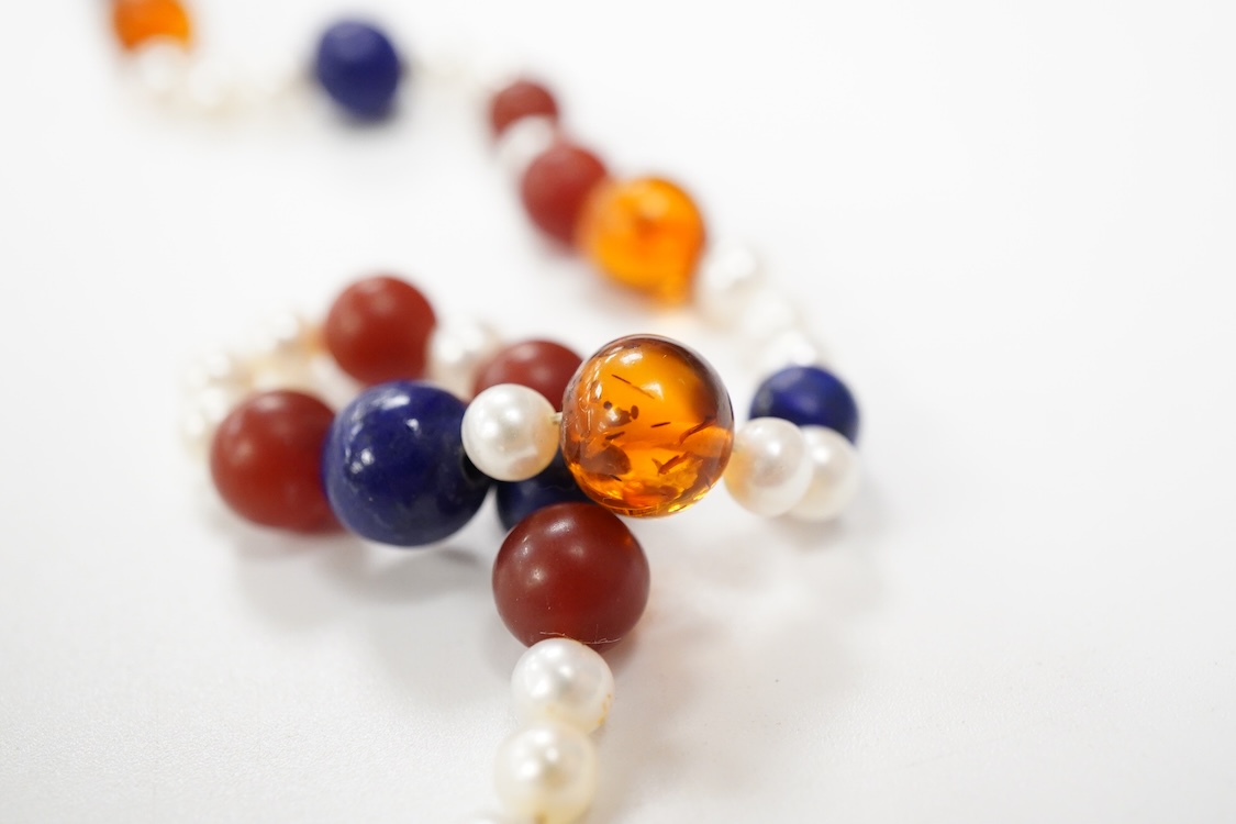 A 20th century Italian lapis lazuli, amber and pearl bead necklace (pearls no tested), with 925 clasp, 124cm.
